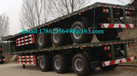 Un camion a base piatta di tre di Alxes 40ft rimorchi resistenti dei semi con 28 tonnellate di carrello di atterraggio