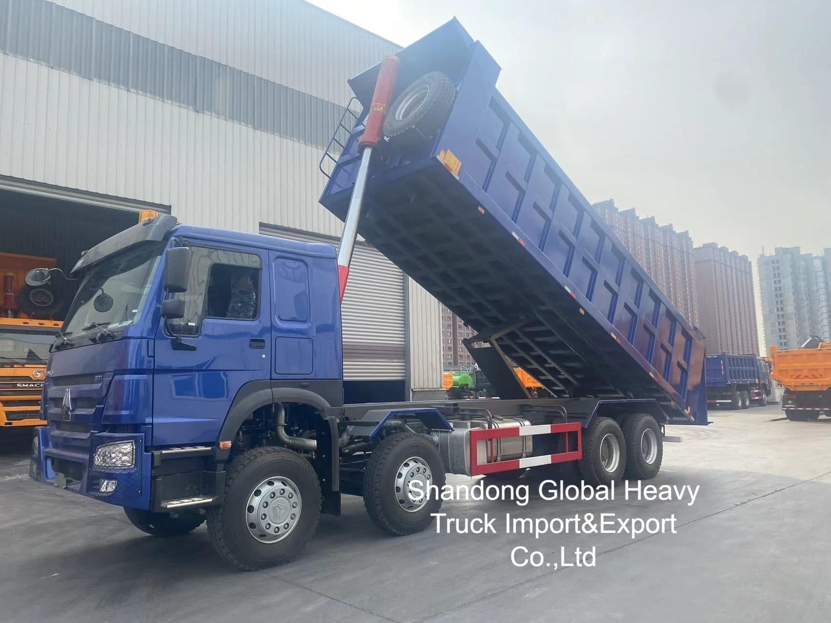 HOWO Camion 8X4 /6X4 Camion spazzatura Sinotruk Tipper 12 ruote 50 tonnellate Camion spazzatura usata